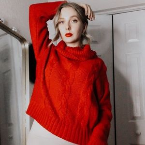 Red Cable Turtleneck Sweater from Revolve